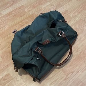 American Traveler luggage bag